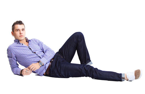 Man lying on the floor - Valokuva, kuva