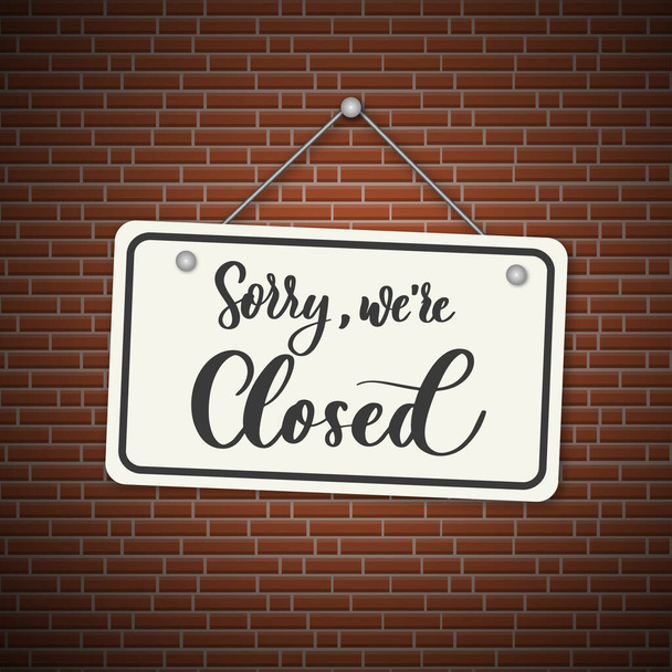 Sorry, we are closed. White sign with shadow isolated on red brick background - Vector, Image