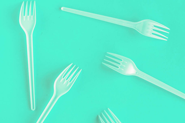 Plastic forks on blue background, top view - Photo, Image