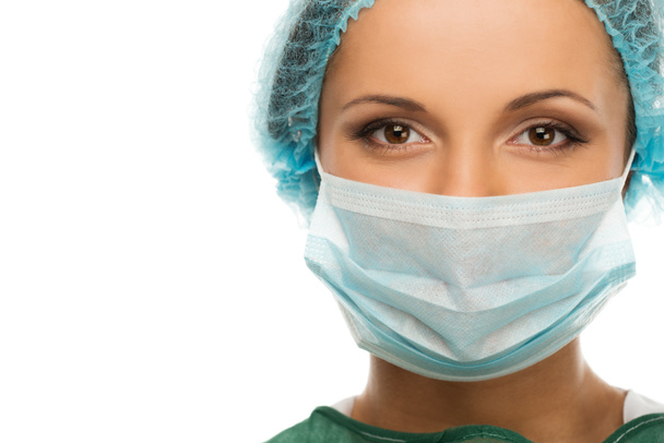 Young woman doctor in cap and face mask  - Photo, Image
