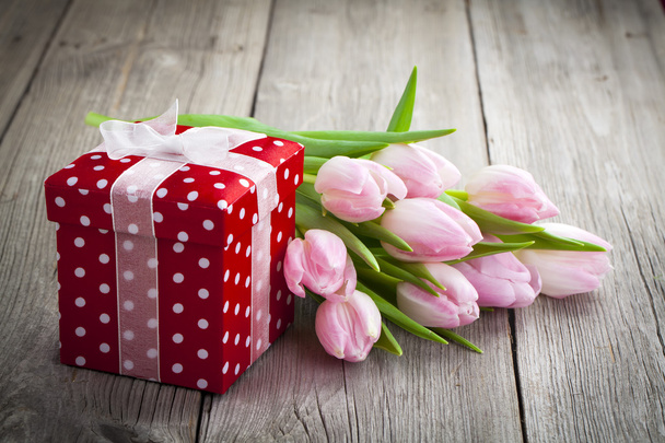 beautiful tulips with red polka-dot gift box. happy mothers day, - Foto, immagini