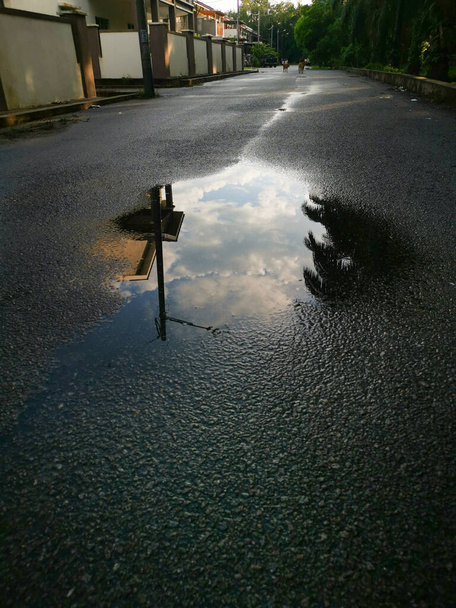 street scene around the puddle of water. - Photo, Image