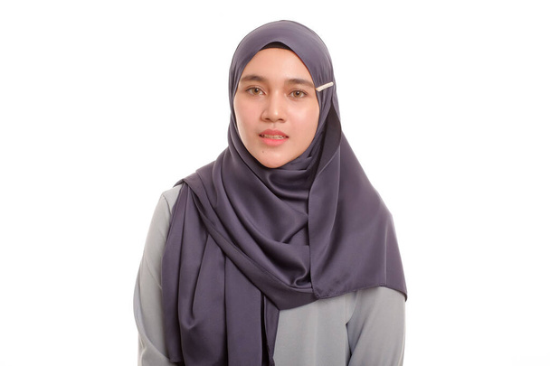 Beautiful Asian Muslimah woman model posing on white background with different expression. - Photo, Image