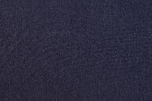 Blue-violet background with a textural surface. Dark fabric. - 写真・画像