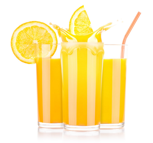 Fresh orange juice in glass with splash - Fotoğraf, Görsel