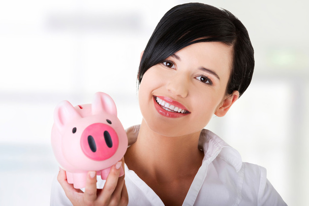 Business woman with her savings - Foto, Imagem