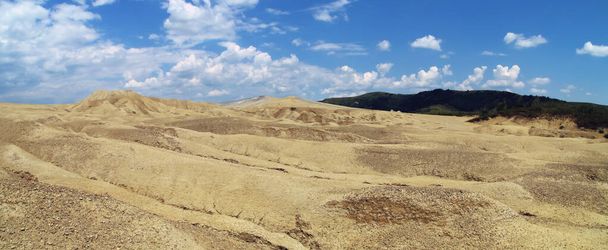 Mud volcanoes (Romanian: Vulcanii Noroiosi) from Berca in Romania. It is a protected geological space where the main attraction is the mud volcanoes, a phenomenon known as cold volcanism. - Photo, Image