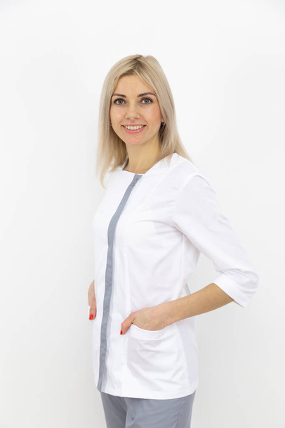 Young female doctor who inspires confidence. Woman hospital worker looking at camera. Medical service and concept. - Фото, зображення