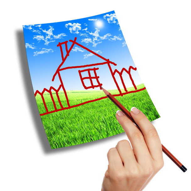 Hand zeichnet ein Haus in den Himmel - Foto, Bild