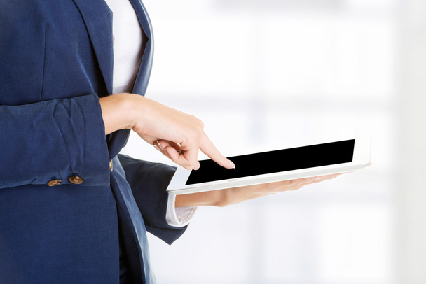 Businesswoman using tablet computer - Φωτογραφία, εικόνα