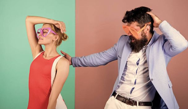Add some fun. friendship. lets celebrate together. Office party. Best friends relations. hipster guy and girl party glasses. bearded man with pretty woman. party fun. couple in love - Photo, image