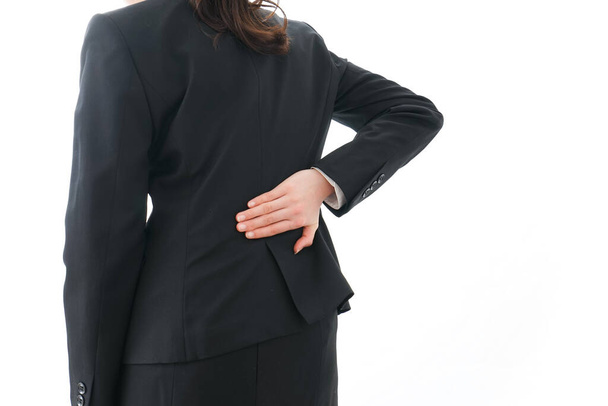 donna d'affari che soffre di mal di schiena - Foto, immagini