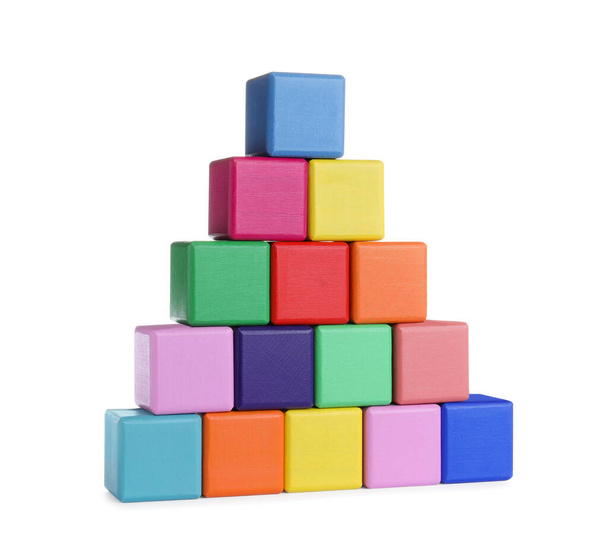 Wooden pyramid made with cubes isolated on white. Child's toy - 写真・画像