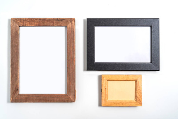 Wood frame or photo frame isolated on the white background. Object with clipping path - Foto, afbeelding