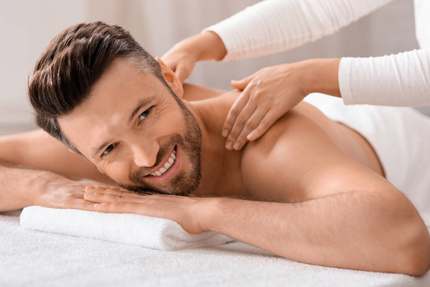 Cheerful middle aged man attending spa salon - Photo, image