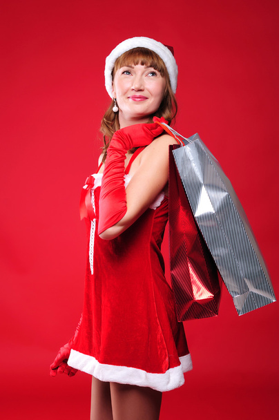 Young girl dressed as Santa Claus - Foto, Imagen