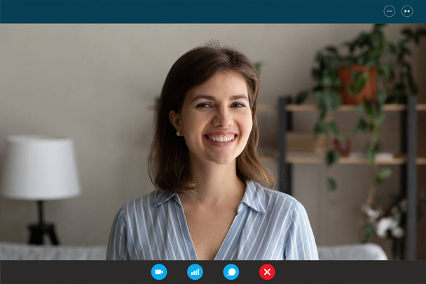 Happy sincere young caucasian woman holding video call at home. - Photo, image