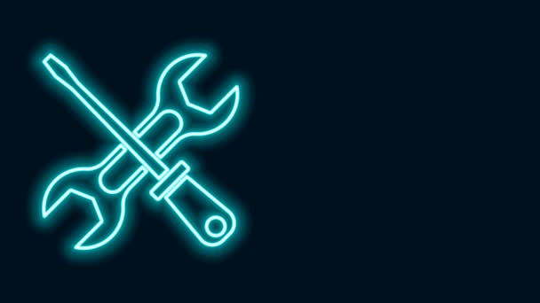 Glowing neon line Screwdriver and wrench spanner tools icon isolated on black background. Service tool symbol. 4K Video motion graphic animation - Footage, Video