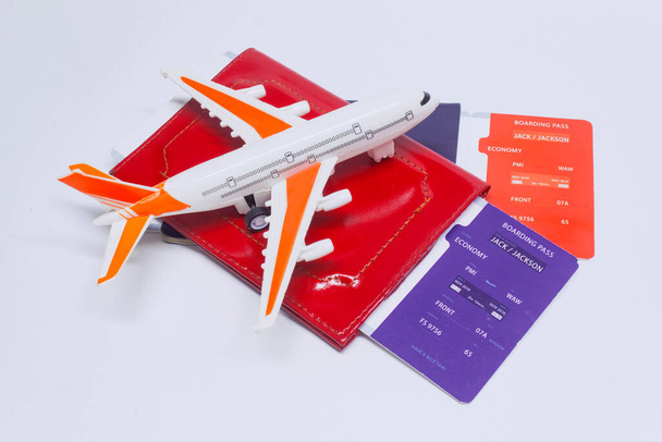 Time to travel. Tourism concept with airplane, boarding tickets and passport - Zdjęcie, obraz