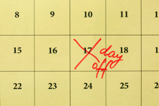 Calendar with marked day off, closeup - Photo, Image
