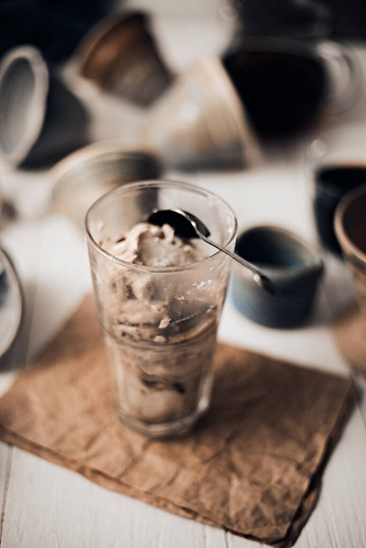 Cold homemade ice cream on white table background. - Foto, Bild