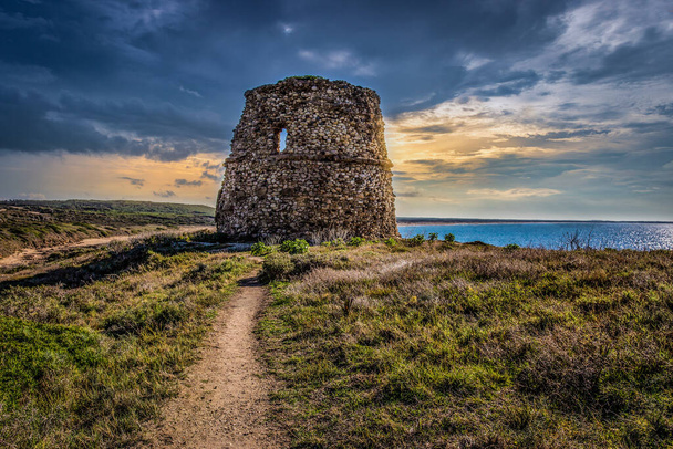 A beautiful view of an old building near the sea in Sardegna, Italy - Foto, afbeelding