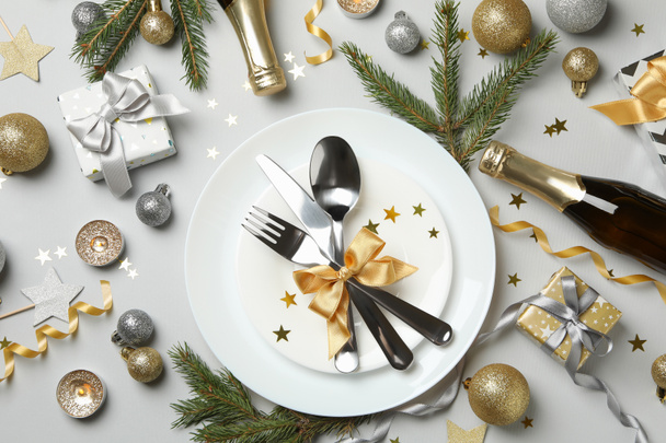 Concept of New year table setting on gray background, top view - Foto, immagini