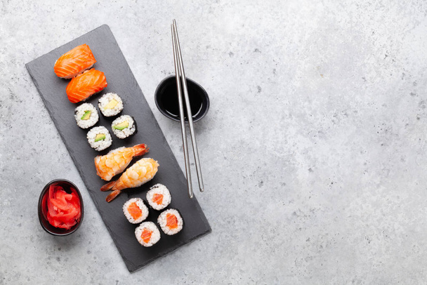 Japanese sushi set. Top view flat lay with copy space - Fotó, kép