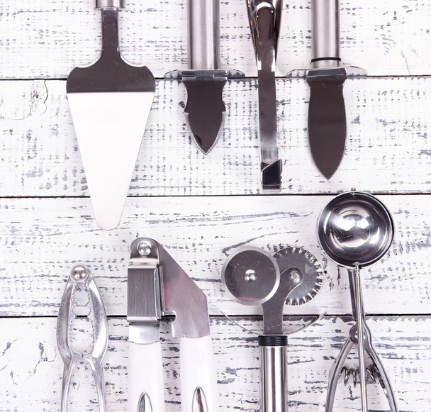 Metal kitchen utensils on table close-up - Foto, imagen