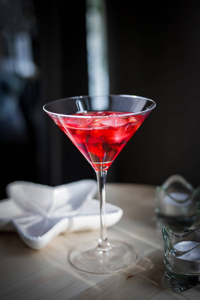 red martini glass with cherry - Foto, Bild