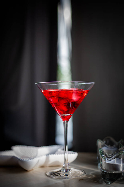 red martini glass with cherry - 写真・画像