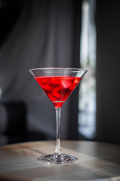 red martini glass with cherry - Foto, imagen