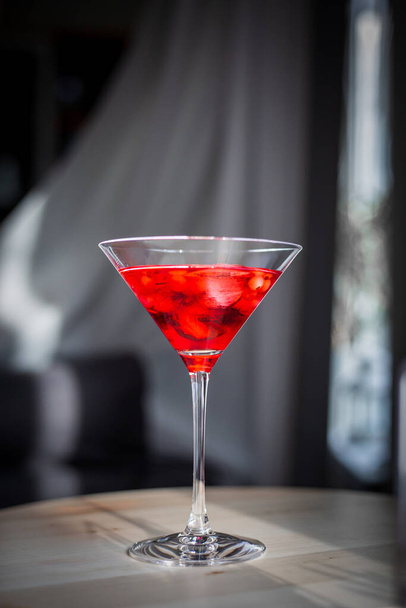 red martini glass with cherry - 写真・画像
