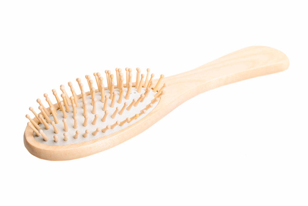 Wooden massage hair brush isolated on white background. - Photo, Image