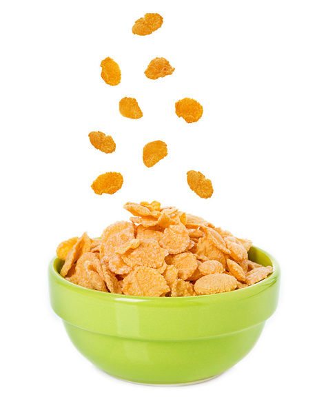 Schüssel mit Cornflakes auf weißem Hintergrund - Foto, Bild