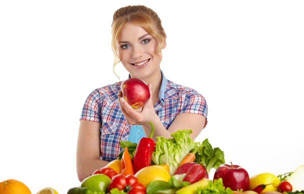 Woman with lot of fruits and vegetables - Photo, Image