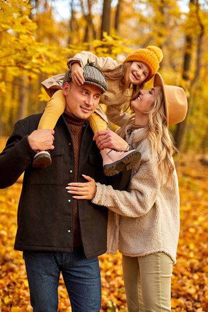 family have fun in autumn park nature - Foto, Imagen
