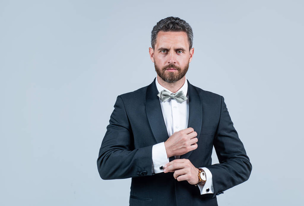 handsome man in tuxedo. confident businessman with bristle. male beauty and fashion. charismatic business man or manager. esthete wear bow tie. successful groomed mature aristocrat - Fotoğraf, Görsel