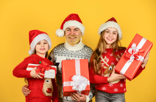 Family time. Holly jolly christmas. Surprising miracle. Dad kids having fun. Father and little daughters celebrate new year together. Christmas becomes special with children. Christmas eve concept - Фото, зображення