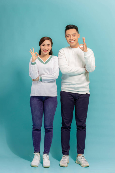 Happy Asian couple love excited smiling with ok hand gesture - Photo, Image