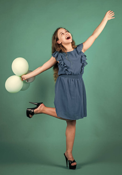 To new beginnings. child having party and dancing with balloons. kid having fun. international childrens day. happy childhood. little child with balloons. Entertainment birthday concept. freedom - Φωτογραφία, εικόνα