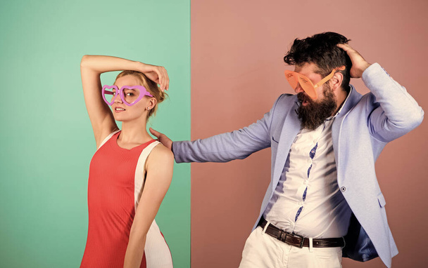 Shell we dance. friendship. lets celebrate together. hipster guy and girl party glasses. bearded man with pretty woman. Office party. Best friends relations. party fun. couple in love - Photo, image