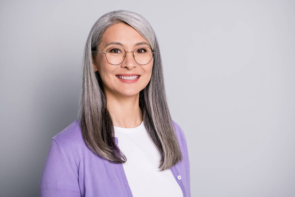 Portrait photo of friendly smiling happy business lady wearing eyeglasses and casual outfit isolated on grey color background - Foto, Imagem