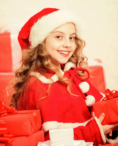 Girl celebrate christmas open gift box. Santa bring her gift. Happy new year concept. Unpacking christmas gift. Winter holiday tradition. Opening christmas gift. Kid happy with christmas present - Foto, Imagem