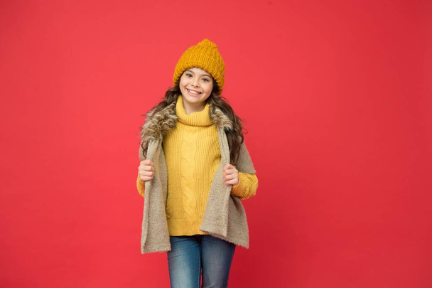 happy teen girl in knitted sweater and hat wear warm clothes in winter season, fashion - 写真・画像