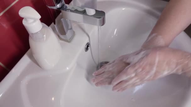 Prevention of coronavirus-destruction of pathogenic bacteria. Wash your hands with liquid soap - Footage, Video