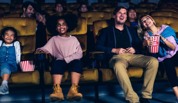 People audience watching movie in cinema theater. - Zdjęcie, obraz