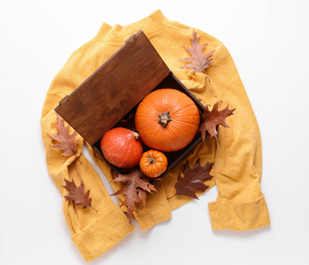 Autumn composition with stylish clothes and pumpkins on white background - Photo, Image