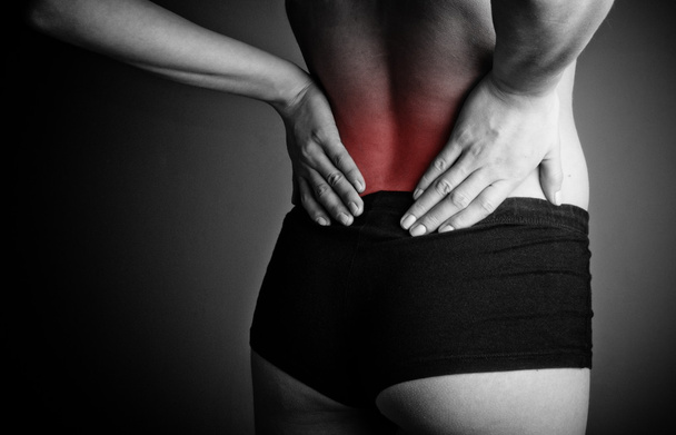 woman suffering from back pain - Zdjęcie, obraz