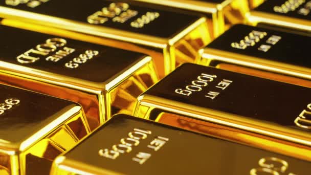 Gold bullion bars stacked in a row - Footage, Video